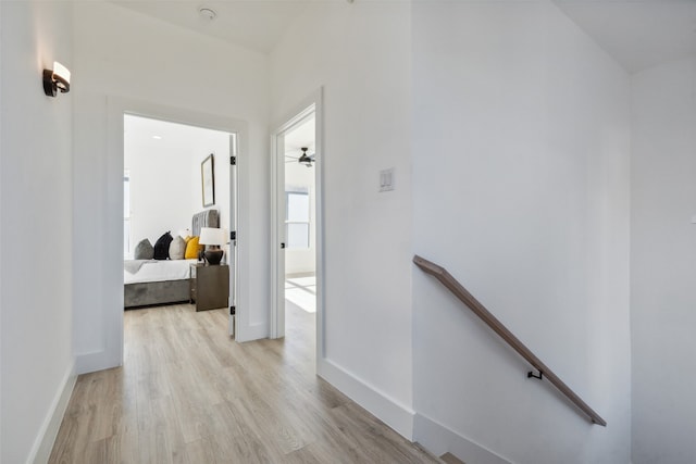 hallway with light wood-type flooring