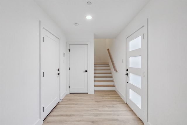 hallway featuring light wood-type flooring