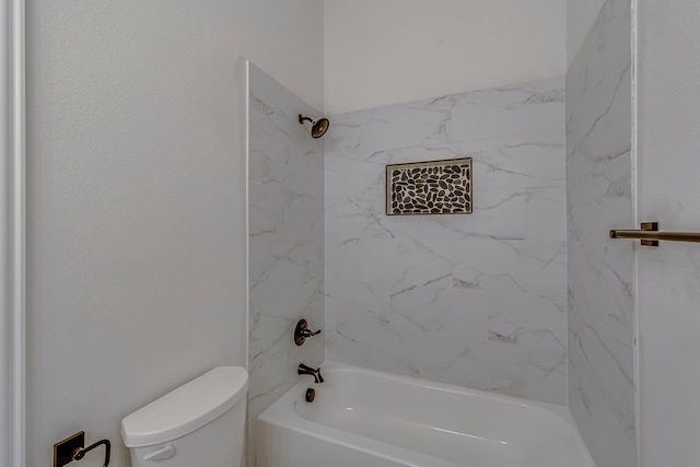bathroom featuring toilet and shower / bathtub combination