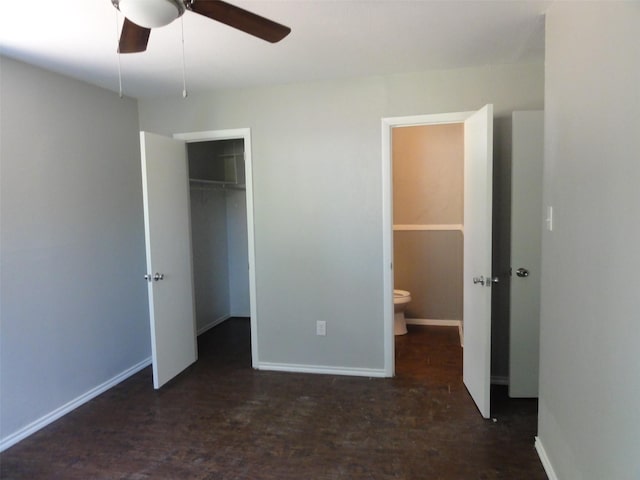 unfurnished bedroom with ceiling fan and a closet