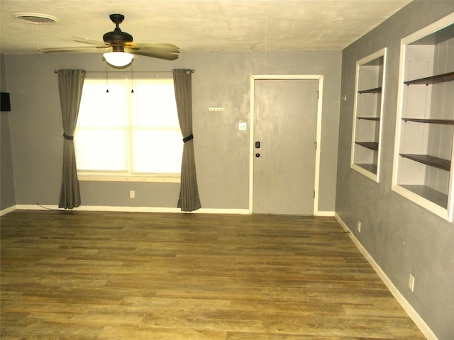 entryway with ceiling fan and hardwood / wood-style floors