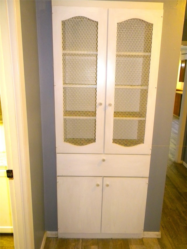 interior details featuring wood-type flooring