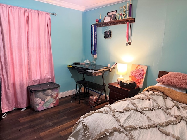 bedroom with ornamental molding and dark wood-type flooring