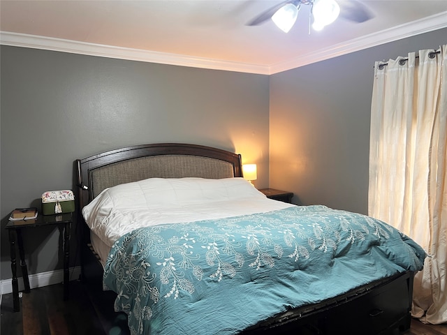 bedroom with dark hardwood / wood-style flooring, ceiling fan, and crown molding