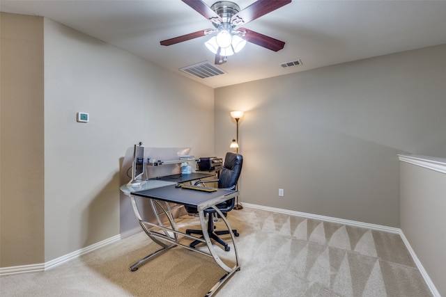 office featuring light colored carpet and ceiling fan