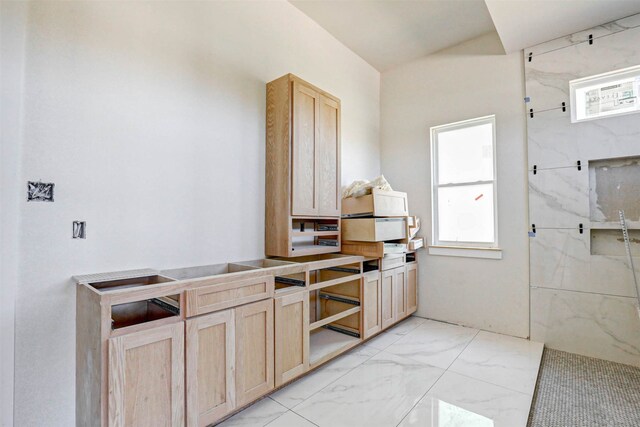 kitchen with light brown cabinetry