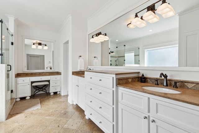 bathroom featuring an enclosed shower, vanity, and crown molding