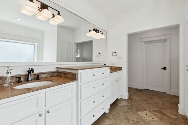 bathroom with vanity and crown molding