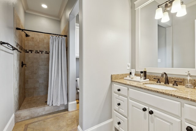 bathroom featuring a tile shower, vanity, toilet, and tile patterned floors