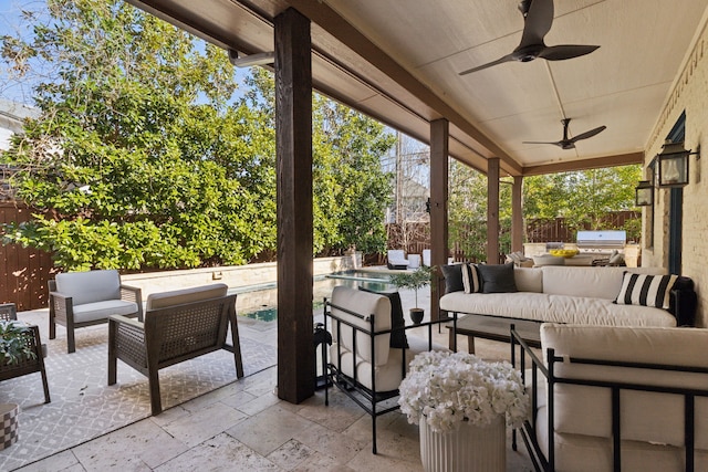 view of patio / terrace with exterior kitchen, outdoor lounge area, area for grilling, and ceiling fan