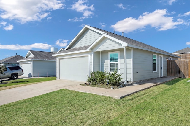 view of front of house featuring a front yard and a garage