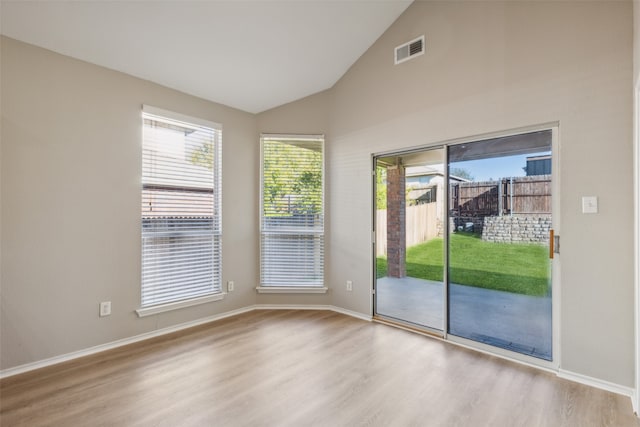 spare room featuring ceiling fan and light wood-type flooring