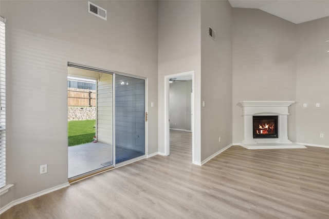 spare room with ceiling fan and light hardwood / wood-style floors