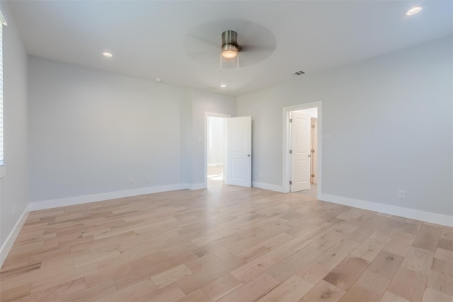 unfurnished room featuring ceiling fan and light hardwood / wood-style floors