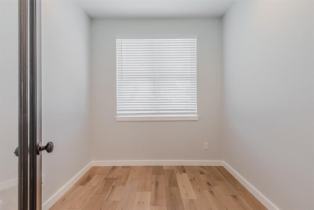 unfurnished room featuring light hardwood / wood-style flooring