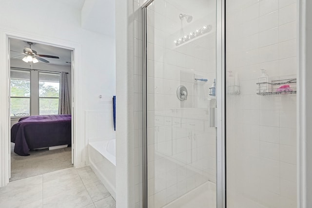 bathroom with tile patterned floors, ceiling fan, and shower with separate bathtub