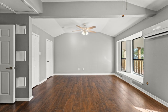 spare room with vaulted ceiling, a wall mounted air conditioner, and dark hardwood / wood-style floors