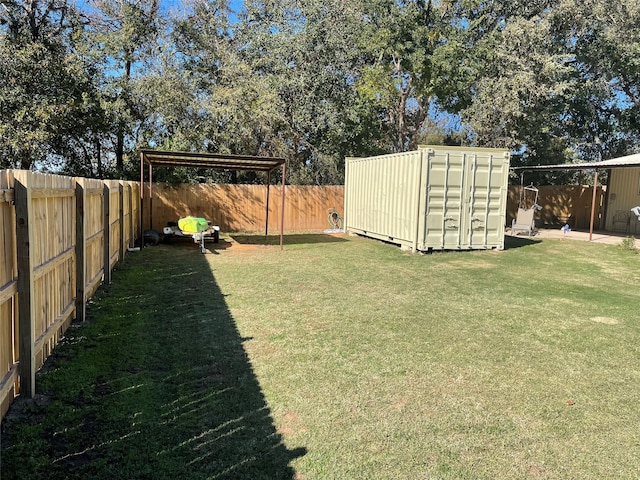 view of yard with a storage shed