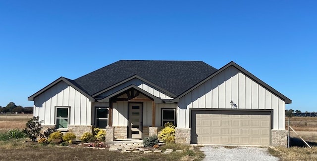 modern farmhouse style home featuring a garage