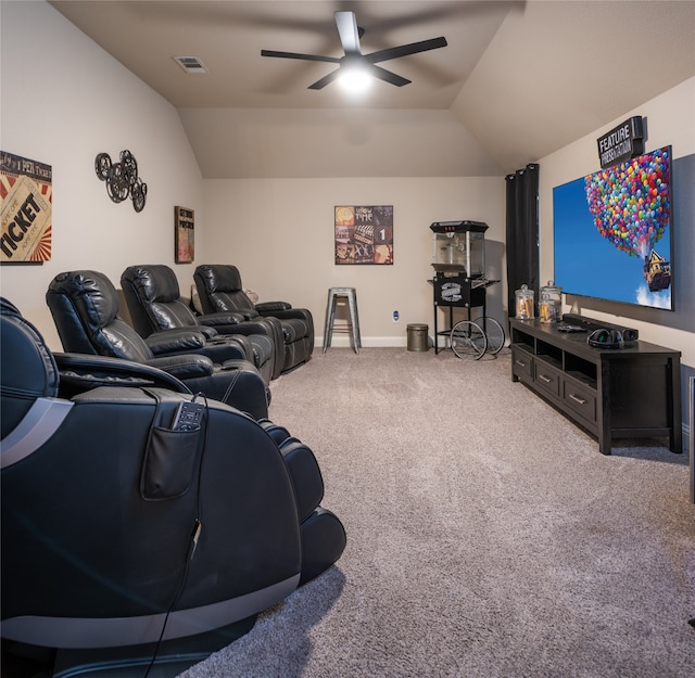 cinema room with carpet floors, ceiling fan, and lofted ceiling