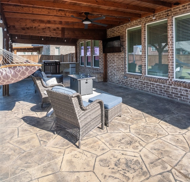 view of patio with ceiling fan