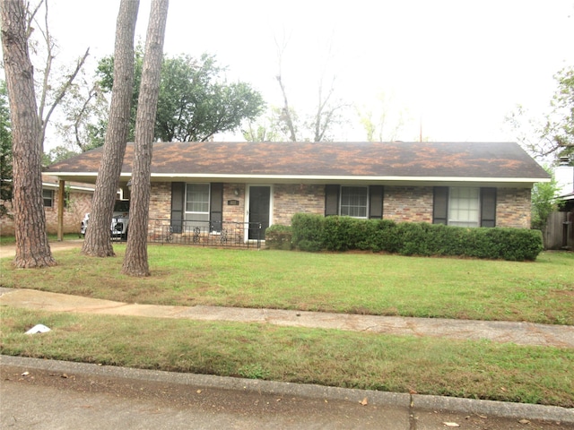 ranch-style house with a front yard