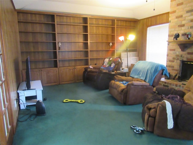 carpeted living room with a fireplace