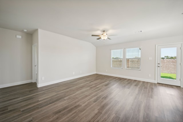 spare room featuring dark hardwood / wood-style floors and ceiling fan