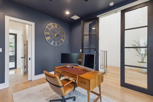 office area featuring hardwood / wood-style floors