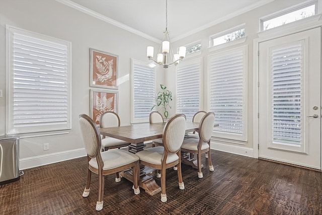 dining room featuring an inviting chandelier, ornamental molding, and dark hardwood / wood-style floors