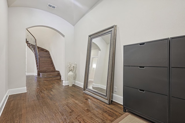 foyer with dark wood-type flooring