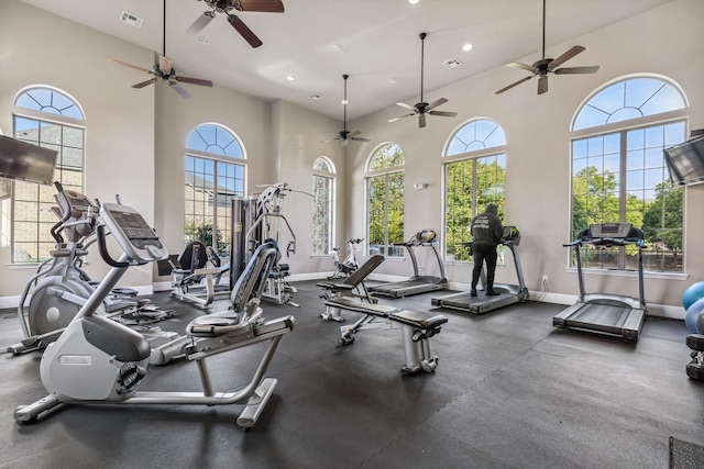 workout area featuring a high ceiling