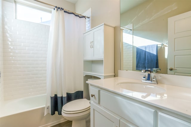 full bathroom featuring vanity, toilet, and shower / tub combo with curtain