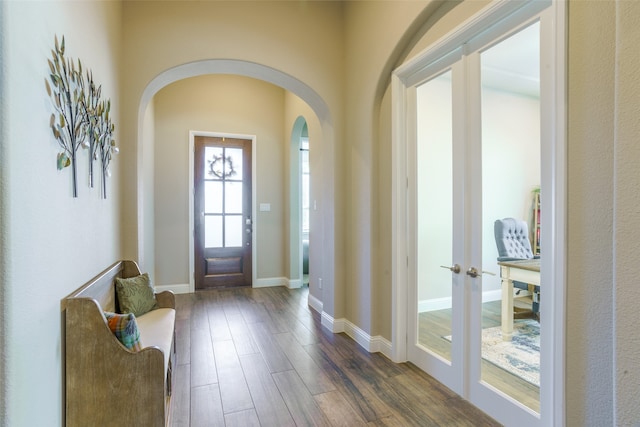 foyer entrance featuring dark hardwood / wood-style floors