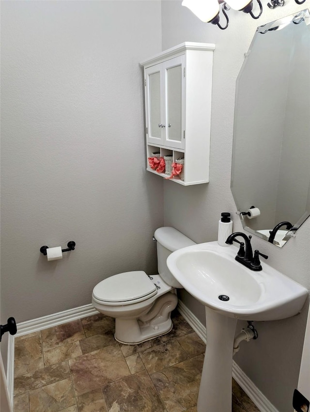 bathroom featuring toilet