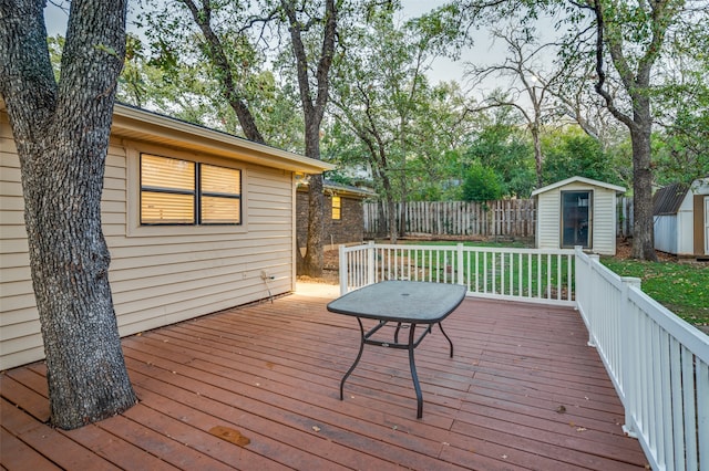 deck featuring a shed