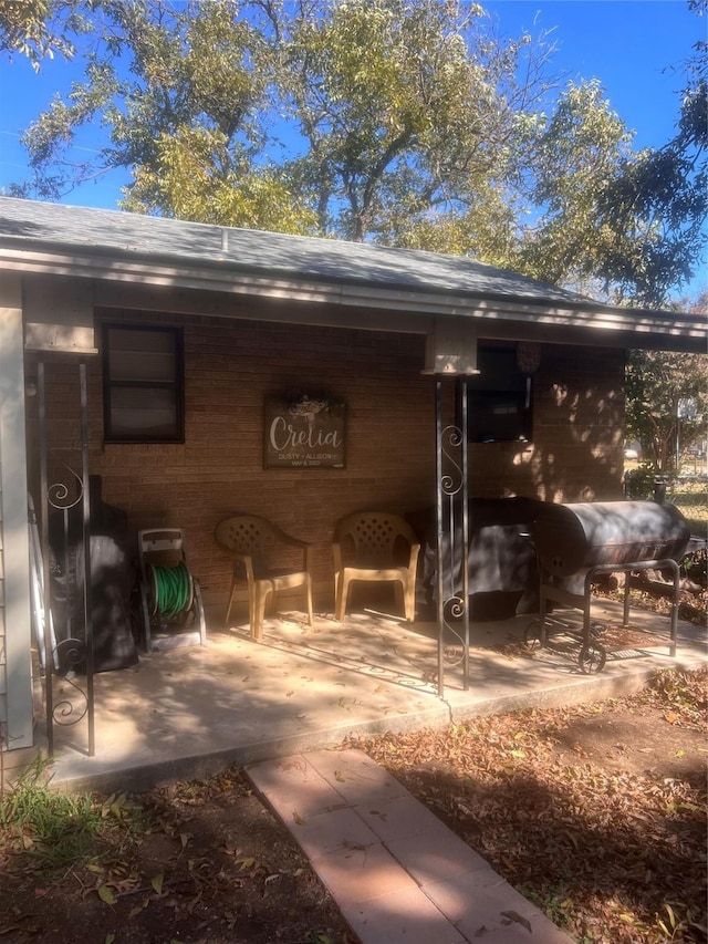 rear view of property with a patio