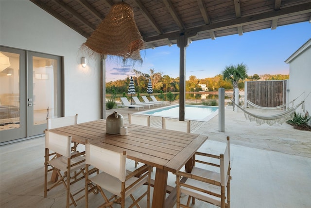 23502 Kate Ln, Arp, TX 75750 - patio terrace at dusk featuring a patio and an outdoor pool