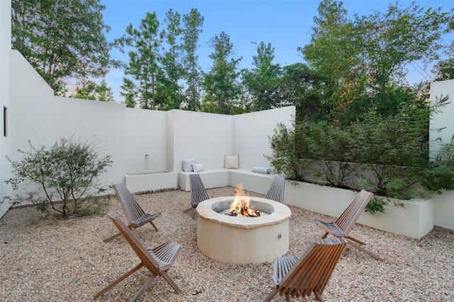 view of patio featuring an outdoor fire pit