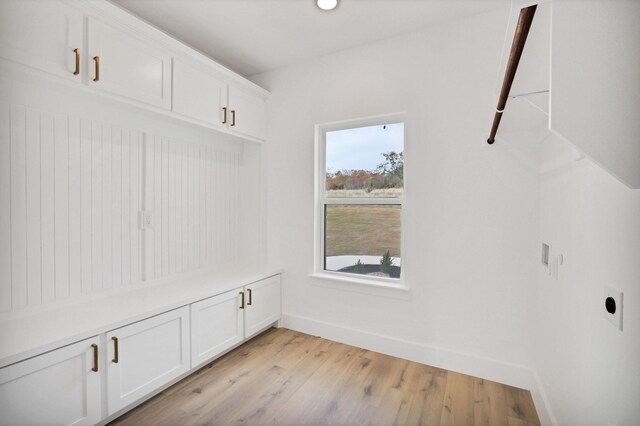 mudroom with light hardwood / wood-style flooring