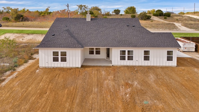 back of house with a patio area