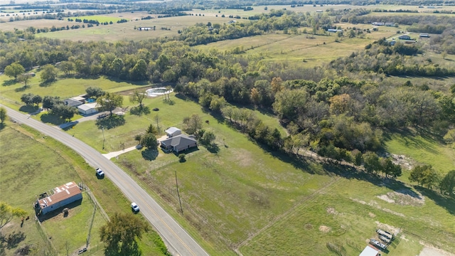 birds eye view of property featuring a rural view