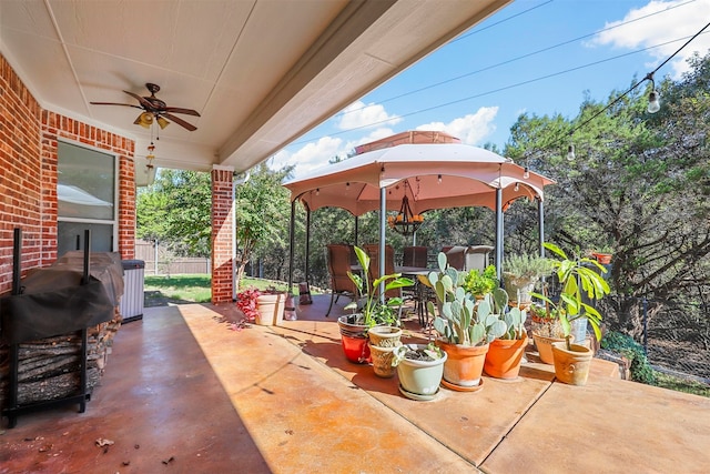 view of patio with a gazebo and ceiling fan