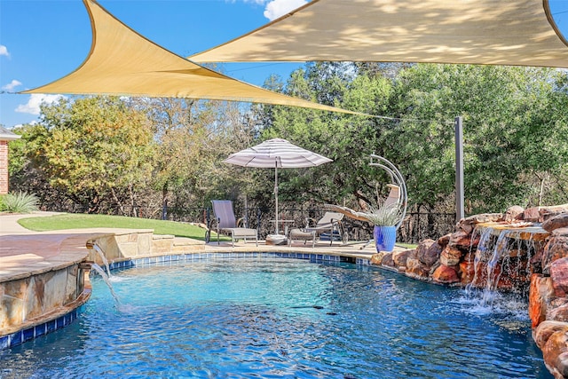 view of pool with pool water feature