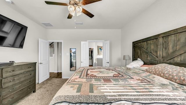 bedroom featuring light carpet and ceiling fan