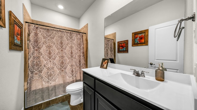 full bathroom featuring vanity, wood-type flooring, shower / tub combo, and toilet