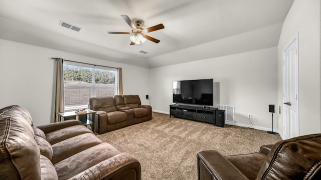 carpeted living room featuring ceiling fan