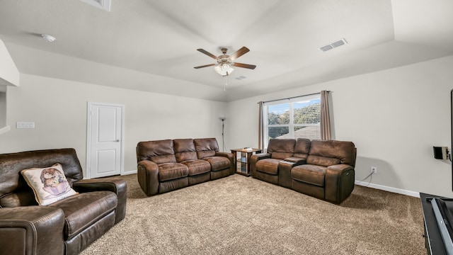 carpeted living room featuring ceiling fan