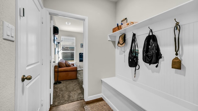 mudroom with hardwood / wood-style flooring