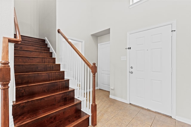 foyer featuring light tile patterned flooring